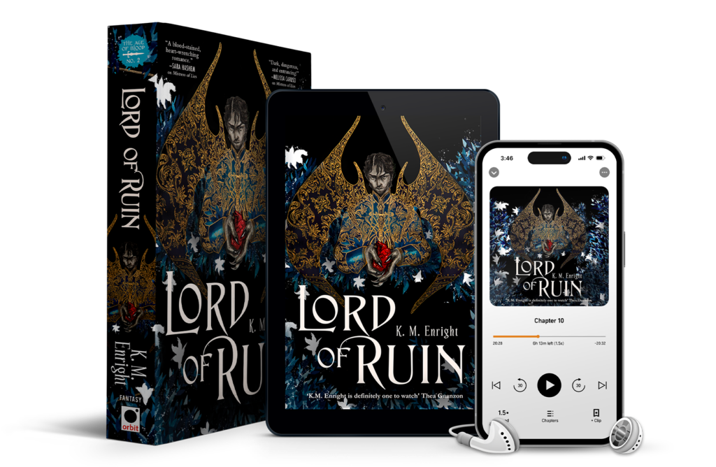 Cover for LORD OF RUIN by K. M. Enright. Black cover, with a dark-haired Filipino man in a Gothic style embodied suit jacket in shades of blue and gold. Black wings with a similar gold embroidered design stretch behind him against a background of blue with white flowers. His hands are tipped in black talons and he holds a bright red anatomical heart. Blurb from Thea Guanzon — ”K. M. Enright is definitely one to watch.”